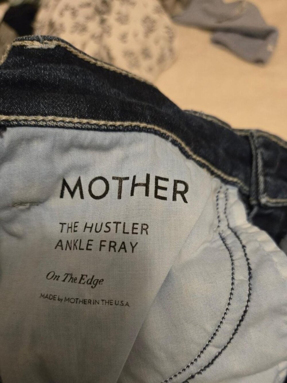 mother dark blue jeans